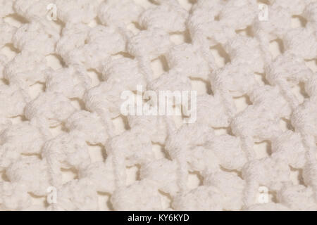 Macro color image of white knitted texture. Stock Photo