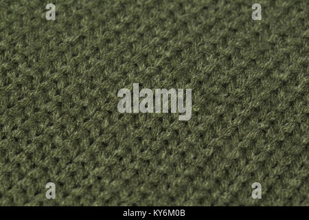 Macro color image of green knitted texture. Stock Photo