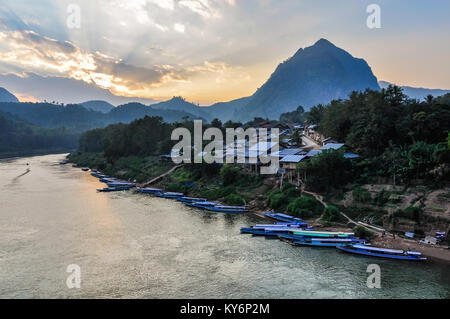 Colorful sunset on the Nam Ou River in Nong Khiaw, Laos Stock Photo