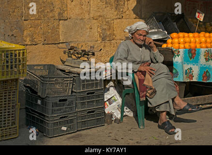 Portrait of a fruit seller in the markets of Cairo Stock Photo