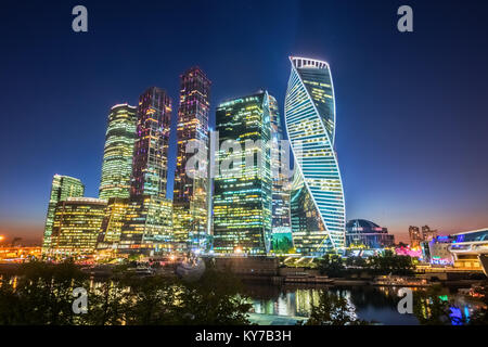 Futuristic skyscrapers of the Moscow International Business Center (MIBC), also named 'Moscow City', at the Moskva River during sunset. Russia. Stock Photo