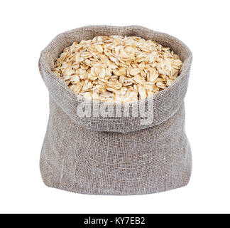 Oat flakes in burlap bag isolated on white Stock Photo