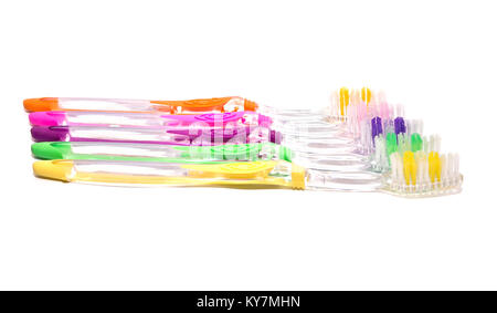 Transparent colorful toothbrushes isolated on white background Stock Photo