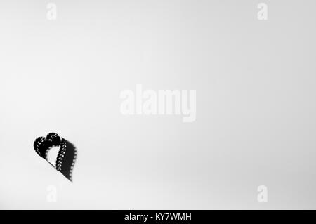 Heart shape made from a 35mm camera film Stock Photo