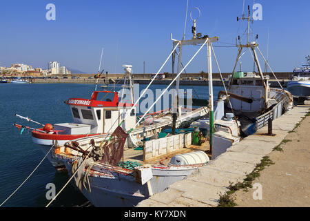Fishing Boats moored up on Quayside in Vinaros Harbour Spain Stock Photo