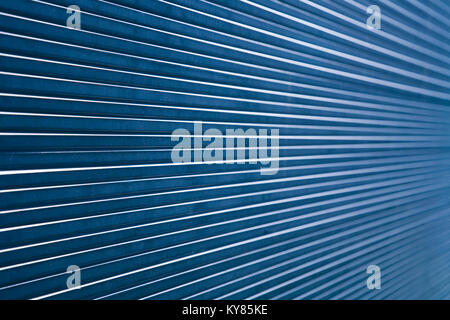 Abstract composition showing parallel, converging lines made from a stack of thick glass panes. Stock Photo