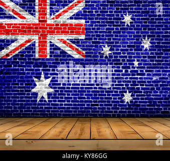 Australia flag painted on brick wall with wooden floor Stock Photo