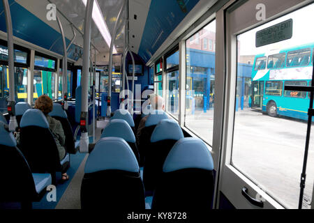 Passengers sitting on an Arriva bus waiting for it to leave North Road bus station, Durham, England Stock Photo