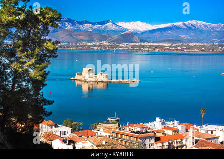 The Bourtzi water castle is a small island with a fortress at the coast of Nafplio in Greece Stock Photo