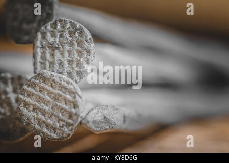 Extreme Close-up of Nails Texture on Wood Stock Photo