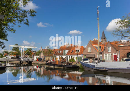 Bridge and old ships at the quay in Edam, Holland Stock Photo