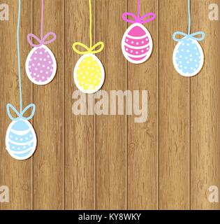 Easter eggs on a brown wooden background Stock Vector