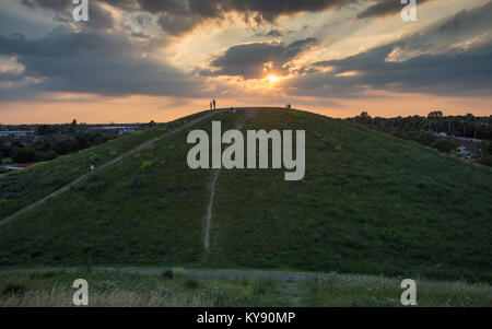 London, England, UK - June 18, 2017: Crowds climb the artificial hills and in Northala Fields park in Ealing, west London. Stock Photo