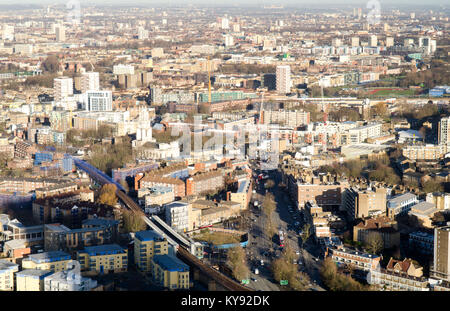 Looking down on London's East End neighbourhoods of Westferry, Limehouse and Mile End from the Docklands Canary Wharf tower. Stock Photo