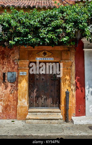 typical colorful facades with balconys of houses in Cartagena de Indias, Colombia, South America Stock Photo