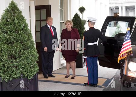 U.S. President Donald Trump welcomes Norwegian Prime Minister Erna Solberg to the White House January 10, 2018 in Washington, DC. Stock Photo