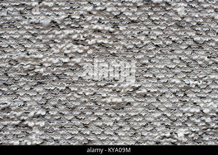 Heather grey knitted fabric made of synthetic yarn. Textured background Stock Photo