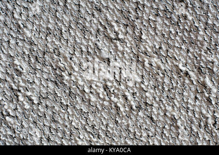 Heather grey knitted fabric made of synthetic yarn. Diagonal direction stitch. Textured background Stock Photo
