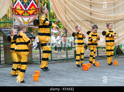 Lviv, Ukraine - April 27.2014: members of the children's dance group performing during the summer playground in the citypark   Lviv, Ukraine Stock Photo