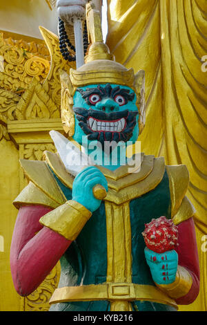 A God statue at ancient Buddhist temple in Mandalay, Myanmar. Stock Photo