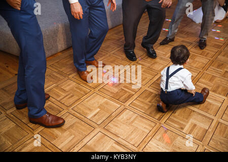 The young guest dancing at the wedding. Stock Photo