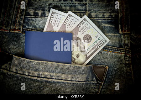 Passport and dollars stick out pocket Stock Photo