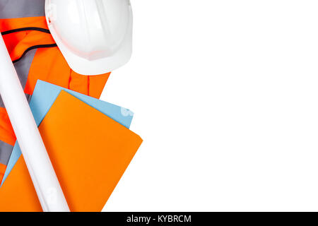 Hard white safety hat and site files laying on a orange hi vis vest on a white isolated background Stock Photo