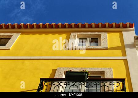 Old colorful and majestic tiled facades with vintage streetlight in Elche,  Alicante, Spain. El Raval neighborhood Stock Photo - Alamy