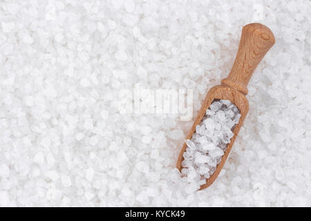 Sea salt background with wooden scoop Stock Photo