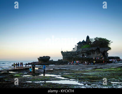 pura Goa Lawah hindu temple sunset backlight silhouette in bali indonesia Stock Photo