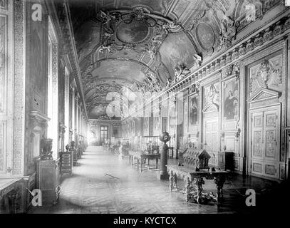 A panoramic view of the Galerie d'Apollon at the Louvre Palace in Paris, highlighting its architectural grandeur and cultural significance. Stock Photo