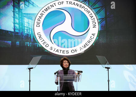 Detroit, USA. 14th Jan, 2018. U.S. Secretary of Transportation Elaine Chao speaks during an event called 'AutoMobili-D' ahead of North American International Auto Show(NAIAS) at Cobo Center in Detroit, the United States, on Jan. 14, 2018. Elaine Chao said on Sunday the Trump administration plans to unveil revised self-driving car guidelines this summer to give carmakers more freedom to develop self-driving car technologies. Credit: Wang Ping/Xinhua/Alamy Live News Stock Photo