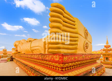 Reclning Buddha at  Pha That temple. Vientiane, Laos Stock Photo