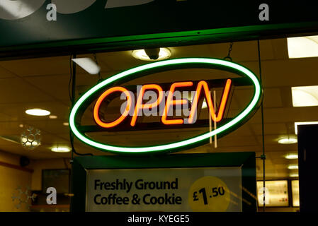 Open neon sign in the window of a takeaway restaurant Stock Photo