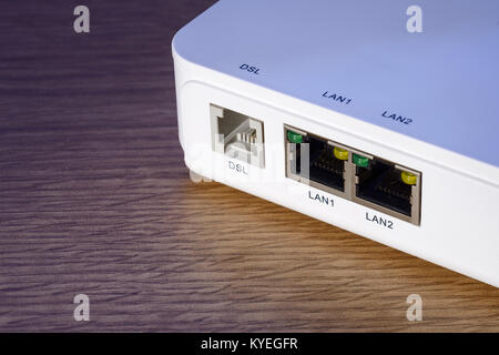 Network cable sockets on a modem router Stock Photo
