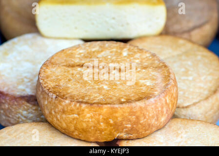 Homemade cheese in the open market in Romania Stock Photo