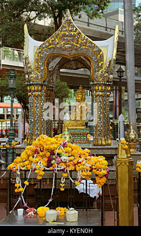 Detail of Erawan Shrine (Thao Maha Phrom Shrine or Shrine of Lord Brahma the Great), with the statue of Phra Phrom. Stock Photo
