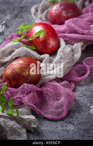 Easter painted red chicken  eggs.  Selective focus Stock Photo