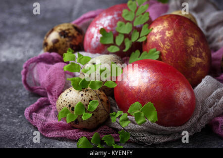 Easter painted chicken and quail eggs.  Selective focus Stock Photo