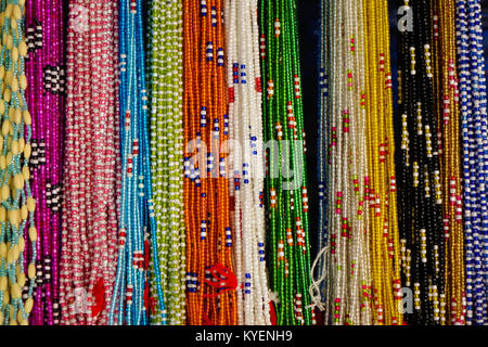 Lots of garlands glittering  hanging for sell in stall in Rishikesh. Stock Photo