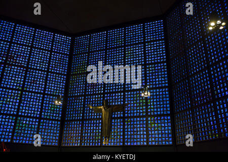 Statue of Jesus Christ by German sculptor Karl Hemmeter in the Kaiser Wilhelm Memorial Church (Kaiser-Wilhelm-Gedächtniskirche) in Berlin, Germany. The New Church also known as the Blue Church designed by German architect Egon Eiermann was built in 1959-1963 next the ruins of the neo-Romanesque church badly damaged during World War II. Stock Photo