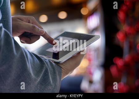 man touch tablet, laptop connecting wifi technology business people workspace Stock Photo