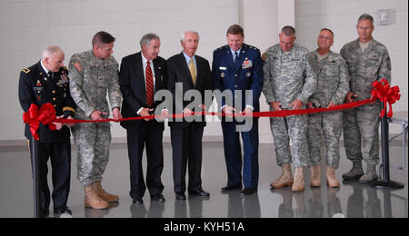 Cutting the ribbon:  Gov. Steve Beshear and Adjutant General Edward W. Tonini are joined by Brig. Gen. Pat Dolan, Col. Steve King, Owensboro Mayor Ron Payne, State Command Chief Warrant Officer James Sims, State Command Sgt. Maj. Greg Armstrong and State Command Master Chief Jim Smith. (Photo by 1st Lt. Mark Slaughter, Kentucky National Guard Public Affairs) Stock Photo