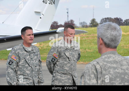 Chief Warrant Officer Five Stephen Hunnicut, commander of Detachment 11, Operational Support Airlift Command based out of Frankfort, Ky., gets promoted at Capital City Airport, Frankfort, Ky. Oct. 25, 2012. (photo by Capt. Stephen Martin, Kentucky National Guard Public Affairs) Stock Photo