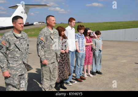 Chief Warrant Officer Five Stephen Hunnicut, commander of Detachment 11, Operational Support Airlift Command based out of Frankfort, Ky., gets promoted at Capital City Airport, Frankfort, Ky. Oct. 25, 2012. (photo by Capt. Stephen Martin, Kentucky National Guard Public Affairs) Stock Photo