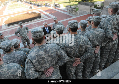 Kentucky Governor, Steve Beshear and the Adjutant General, Maj. Gen. Edward W. Tonini, speak to new Kentucky Guard recruits on the steps of the State Capitol in Frankfort, Ky., Nov. 20, 2012. (Kentucky National Guard photo by Sgt. Scott Raymond) Stock Photo