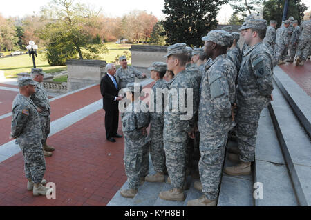 Kentucky Governor, Steve Beshear and the Adjutant General, Maj. Gen. Edward W. Tonini, speak to new Kentucky Guard recruits on the steps of the State Capitol in Frankfort, Ky., Nov. 20, 2012. (Kentucky National Guard photo by Sgt. Scott Raymond) Stock Photo