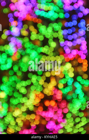 Bright abstract bokeh background with new year tree lights Stock Photo