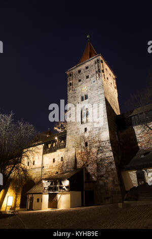 The city gate and medieval defensive tower of the Tiergärtnertor in Nuermberg, Germany. The walled city retains much of defences dating from the Middl Stock Photo