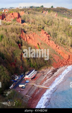 Red Permian breccia rockfall on the cliffs at Oddicombe beach,Babbacombe,Torquay, Devon. Stock Photo